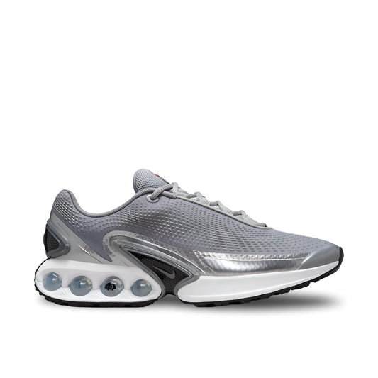 Nike Air Max DN Premium Metallic Silver White sneaker with Dynamic Air cushioning"

"Side view of Nike Air Max DN Premium Metallic Silver White with breathable mesh upper"

"Close-up of Nike Air Max DN Premium metallic silver sneaker with TPU midfoot shank and rubber outsole"