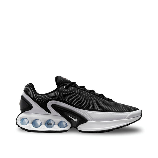 Nike Air Max DN Black White Panda sneaker with Dynamic Air cushioning"

"Side view of Nike Air Max DN Panda black and white breathable mesh sneaker"

"Close-up of Nike Air Max DN Panda sneaker with chunky heel and visible Air unit"
