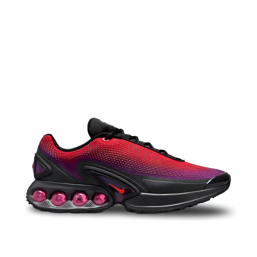 "Nike Air Max DN All Day sneaker with red to purple gradient mesh upper and black accents"

"Side view of Nike Air Max DN All Day with semi-translucent pink Air Max unit"

"Close-up of Nike Air Max DN All Day breathable mesh and Dynamic Air cushioning"