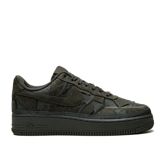 "Nike Air Force 1 Low x Billie Eilish Black sneaker with quilted stitch pattern and geometric overlays"

"Side view of Nike Air Force 1 Low Billie Eilish Black with black rubber sole and co-branded details"

"Close-up of Nike Air Force 1 Low x Billie Eilish Black showing cork insoles and textured upper"

"Nike Air Force 1 Low Billie Eilish Black – sustainable unisex sneaker collaboration"