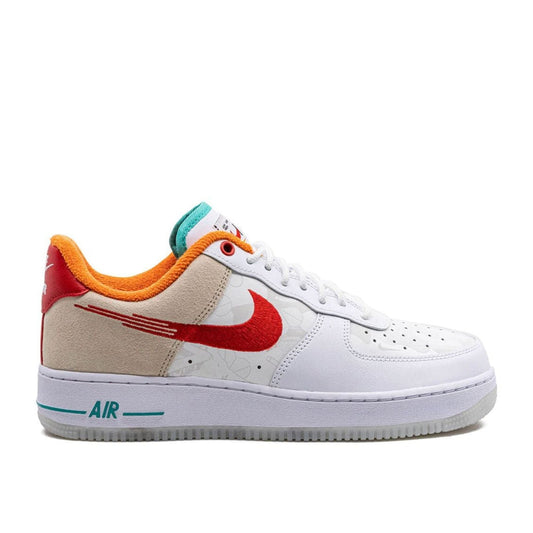 "Nike Air Force 1 Low Just Do It sneaker with white leather upper and slogan branding"

"Side view of Nike Air Force 1 Low Just Do It in orange and white colorway"

"Close-up of Nike Air Force 1 Low Just Do It showing original 1988 slogan graphics"

"Nike Air Force 1 Low Just Do It black edition with tonal laces and branding"
