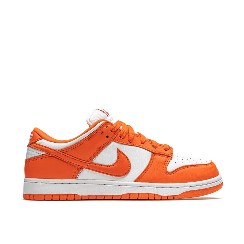 "Nike Dunk Low Retro Syracuse sneaker with white leather base and orange overlays"

"Side view of Nike Dunk Low Syracuse with breathable mesh tongue and orange rubber outsole"

"Close-up of Nike Dunk Low Retro Syracuse showing premium leather and embroidered heel branding"

"Nike Dunk Low Retro Syracuse – classic collegiate basketball-inspired sneaker with vibrant orange and white colorway"