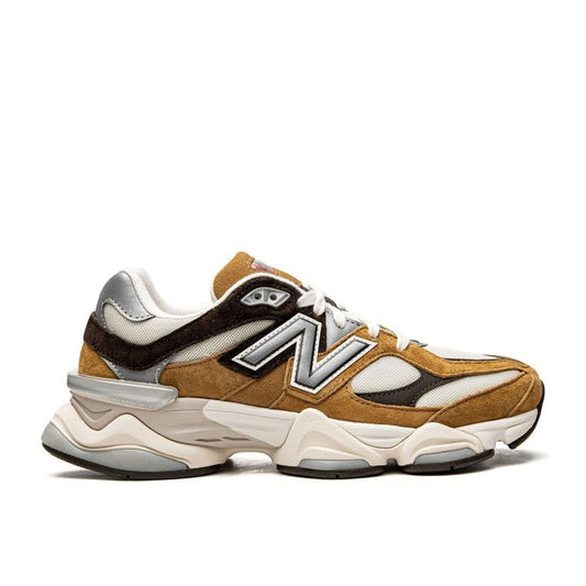 "New Balance 9060 Workwear sneaker with tan suede, chocolate brown nubuck, and cream mesh upper"

"Side view of New Balance 9060 Workwear with reflective 3M accents and chunky midsole"

"Close-up of New Balance 9060 Workwear sneaker showing dual-density cushioning and resin heel clip"

"New Balance 9060 Workwear – rugged lifestyle sneaker with eco-friendly recycled foam insole"
