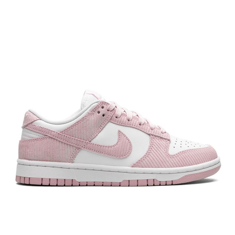 "Nike Dunk Low Pink Corduroy sneaker with white leather base and pink corduroy overlays"

"Side view of Nike Dunk Low Pink Corduroy with perforated toe box and white midsole"

"Close-up of Nike Dunk Low Pink Corduroy showing textured pink corduroy panels and rubber outsole"

"Nike Dunk Low Pink Corduroy – feminine and stylish women’s sneaker with retro vibe"