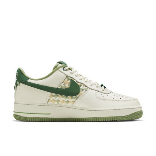"Nike Air Force 1 Low NAI-KE Surfaces sneaker with green woven textile upper and white midsole"

"Side view of Nike Air Force 1 Low NAI-KE Surfaces with translucent green outsole"

"Close-up of Nike Air Force 1 Low NAI-KE Surfaces showing textured green weave and leather accents"

"Nike Air Force 1 Low NAI-KE Surfaces in Green Weaves – sustainable sneaker with classic silhouette"
