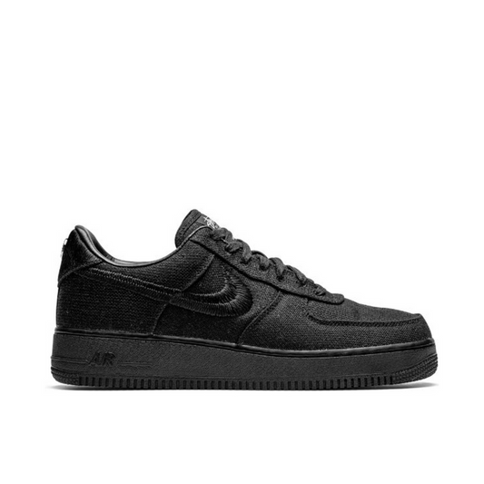 "Nike x Stüssy Air Force 1 Low Black sneaker with smooth leather upper and monochromatic design"

"Side view of Nike x Stüssy Air Force 1 Low Black with tonal black midsole and outsole"

"Close-up of Nike x Stüssy Air Force 1 Low Black showing subtle Stüssy branding on tongue and heel"

"Nike x Stüssy Air Force 1 Low Black – minimalist streetwear collaboration sneaker"